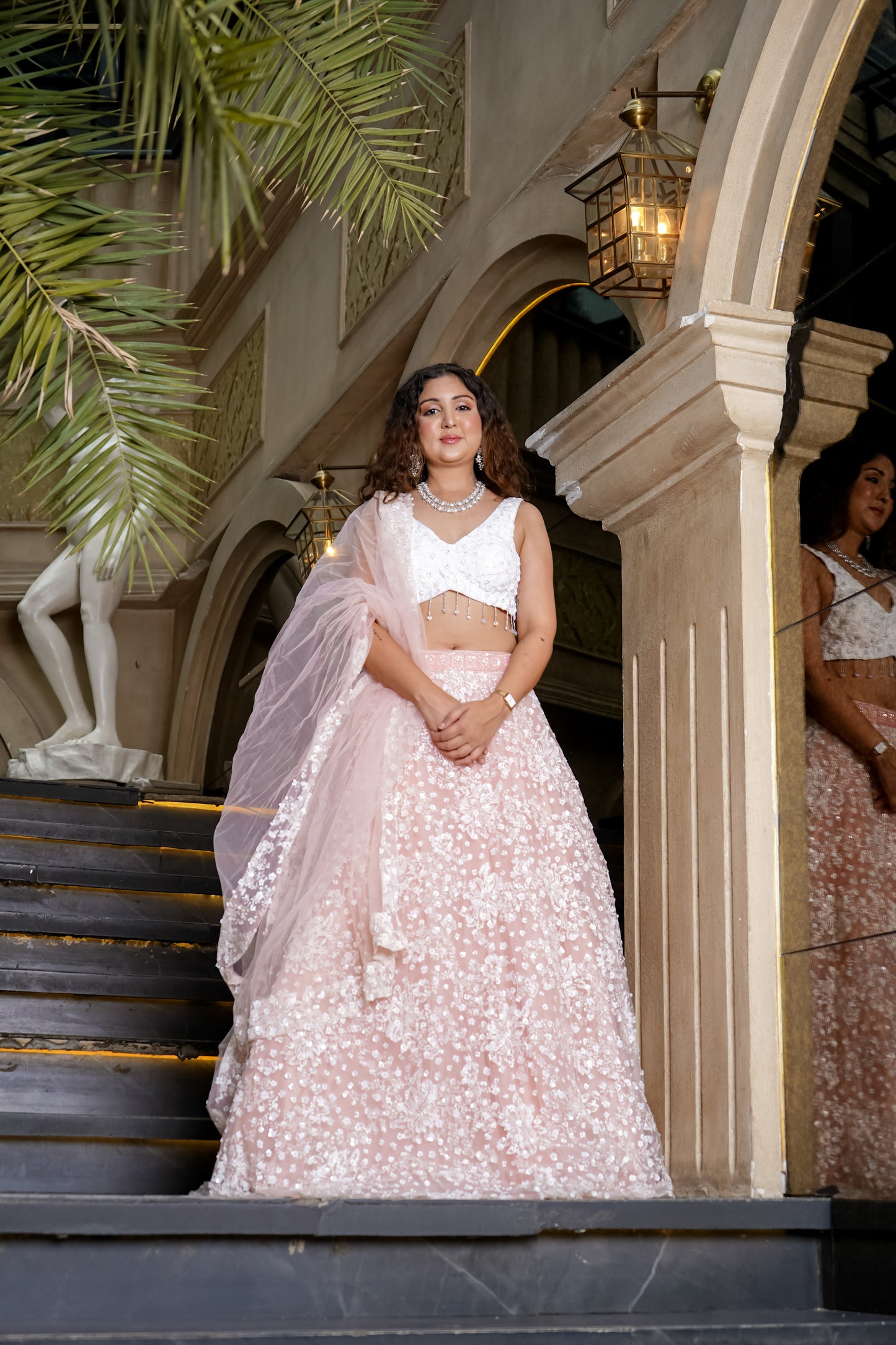 Peach Pastel Net Lehenga With Floral Paintwork
